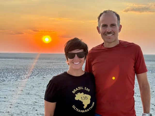 Harvey and Kelly at sunset on a salt flat